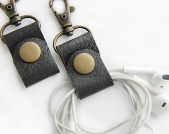 PAIR of Earbud Holders Black Leather Cord Keepers Headphone Wrap Cord Wrapper with Clip