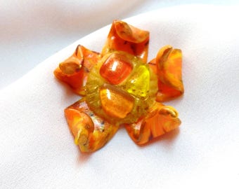 Solar flower cabochon and its glass mosaic.