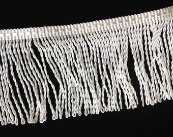 Off-White Twisted Fringe with decorative header, rayon, shiny, 3" long, vintage, offering 8.375 yards in 1 lot.