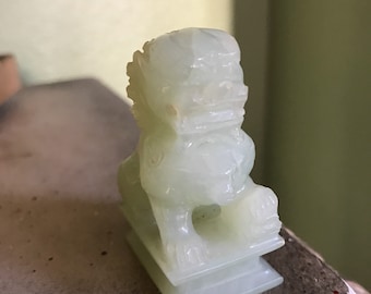 Miniature carved jade foo dog