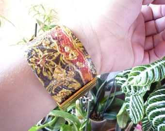 Bangle cuff with orange and Red rhinestones