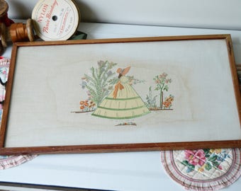 A beautiful embroidered needlepoint tray