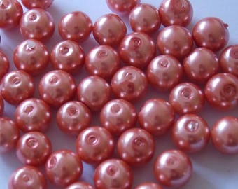 Set of 30 round pearls orange 8mm