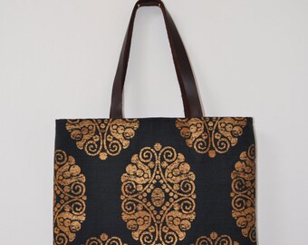 bag with leather handles