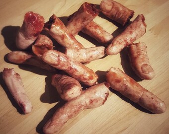 one severed gory human finger - oddity - horror - curiosity - gory