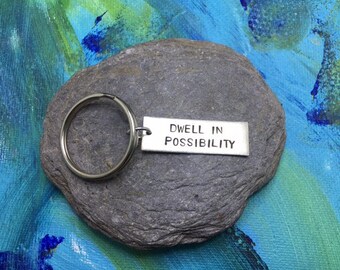 Dwell in Possibility Keychain charm