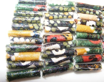 She's in our corner. We weren't sure until she gave us the sparkle detail. Then we were sure. Fabric Beads, textile art bead, Australian
