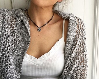 Silver sunflower charm choker on black cord with adjustable sliding knots by Serenity Project