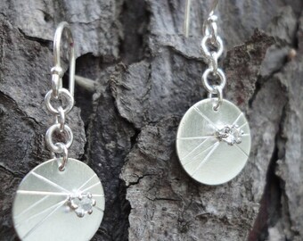 Single Starburst Silver Earrings
