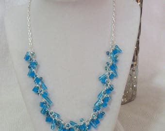 Blue glass and crystal cluster necklace