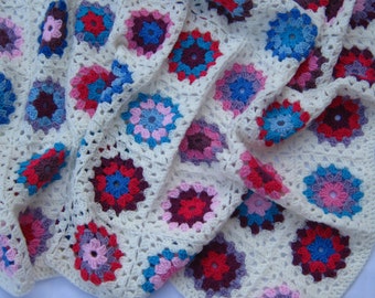 Multicoloured granny circle crochet blanket
