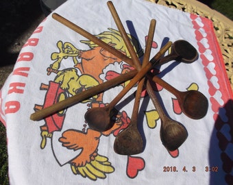 Collection of five used wood spoons