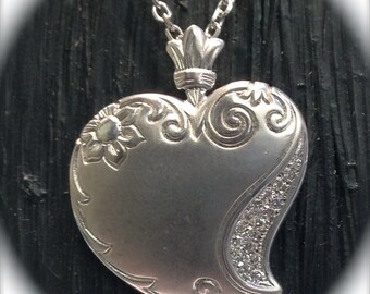 Hand engraved Sterling Silver heart necklace with Diamonds.