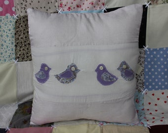 Handmade bird cushion with floral lilacs and purples with broderie anglais 16" square