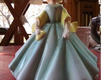 Beautiful Napco Ceramic Figurine with a planter