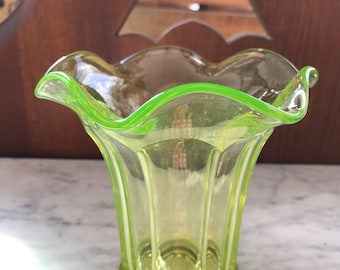 Antique fluted vaseline glass vase.