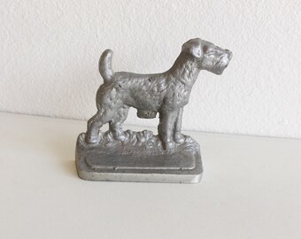 cast aluminum doggie doorstop or bookend