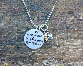 You make a Difference Everyday hand stamped pendant. Your choice of either Necklace or Keychain