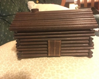 Vintage log cabin piggy bank
