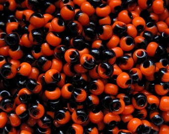 6-0 Czech Tangerine Orange, Black Harlequin Stripe Opaque Seed Beads – 4mm Rocailles – 20 Grams.