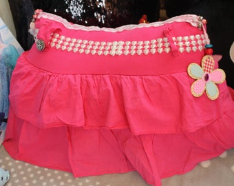 Cushion made from a ruffled skirt pink very girly