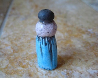 female figure, bead, kiln fired, raku