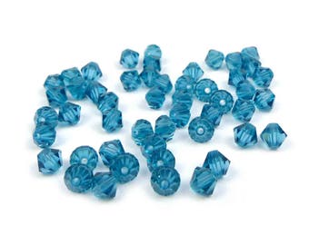 50 x BLUE ZIRCON Swarovski® 4mm bicone beads