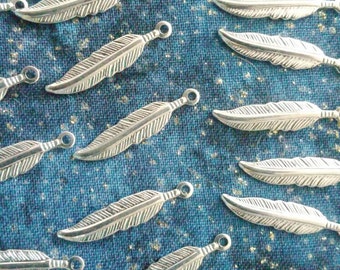 18×4mm silver plated feather charm..pack of 15