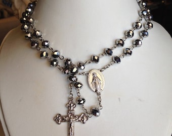 vintage rosary prayer beads in faceted mercury glass beads made in italy. circa 1980.
