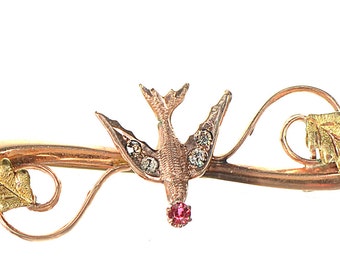 10k Victorian flying bird pin brooch with ruby and diamond paste stones
