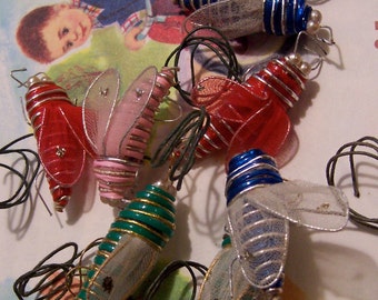 little colorful flying insects