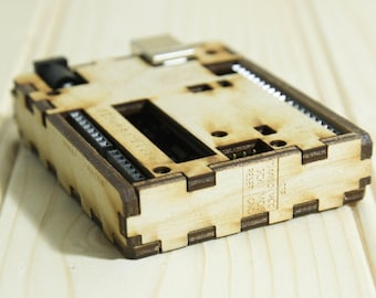 Laser cut arduino uno wood case made from birch ply. Custom logo
