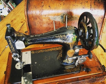 SALE! Antique Singer Sewing Machine made in 1893 with handcrank flywheel and original wooden case