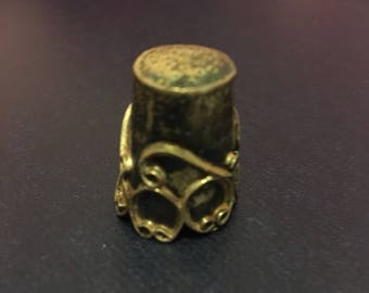 For the Woman that has EVERYTHING ! Vintage sterling silver thimble, beautiful details. Marked 925. Measures 1" high.
