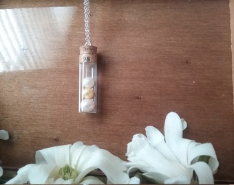 3 Pearls in an antique watchmakers glass vial on an 18inch silver rolo chain