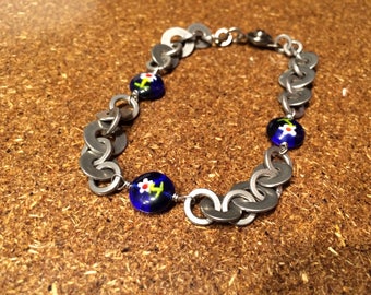Hardware jewelry bracelet with stainless steel washers and flower glass beads