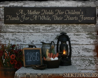 A Mother Holds Her Children's Hands For A While, Their Hearts Forever Primitive Smokehouse Sign Decor