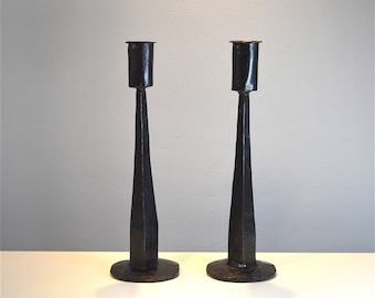 Pair of medieval style hand made wrought iron candlesticks aged metal candle stick