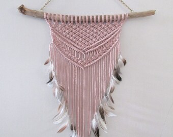Pink wood macrame wall driftwood and feathers