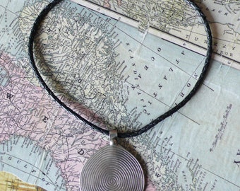 Berber silver pendant, spiral of life, Morocco, Berber jewelry, talisman, twisted black leather cord,