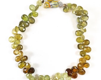Strand of Finely Faceted Grossular Green Garnet Pear shaped Top drilled Briolette Beads