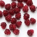 Glass lampwork berries beads Raspberry. Deep red color.