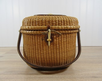 REDUCED.....Nantucket lightship basket purse with swing wood handle, clasp, hinged lid , wood base, shell top design- nice condition