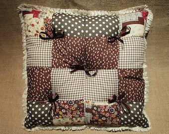 Brown square patchwork cushion