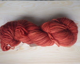 Pure Merino wool, hand dyed with madder root