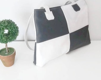 Grey charcoal and white Orion bag