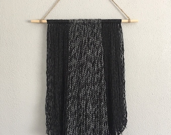 Black and charcoal wall hanging