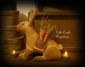 Primitive Bunny Sitting with Carrots