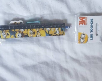 Dispicable Me kids stationary set including Dispicable Me pencil, sharpener and rubber.