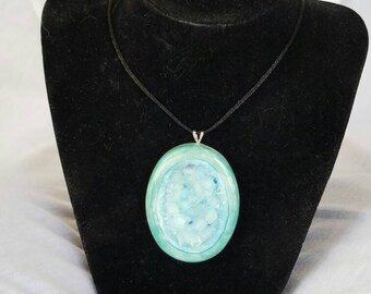 Teal oval melted glass pendant